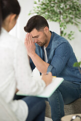 emotional man talking to his therapist
