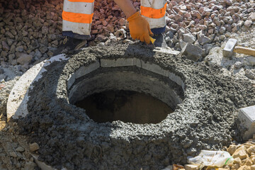Street paving installation of laying sewer manholes of improvement of urban areas