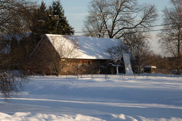Old abandoned barn photo in winter time