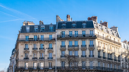 Fototapeta na wymiar Paris, beautiful buildings, place Gambetta in the 20e district 
