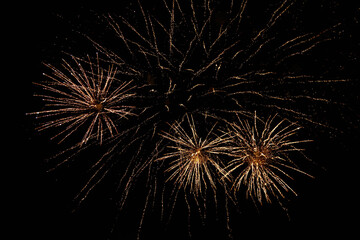 Very beautiful fireworks against the black sky. Graphic resource for design. Underlay or undercoat