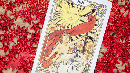 Tarot cards in Christmas decoration. Esoteric, fortune telling and predictions