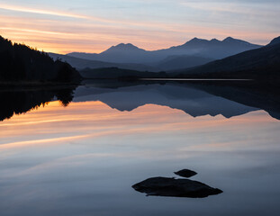 View of Snowdon after sunset reflected in the calm waters of Llynnau Mymbyr , Capel Curig, Snowdonia National Park, North Wales