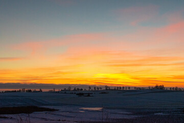 sunset in the winter field