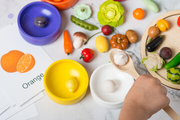 items for classes with children. the child learns to paint.
