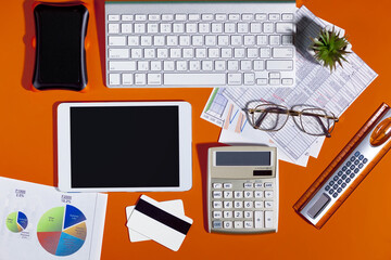 Items for business on bright colors in the office on the table 