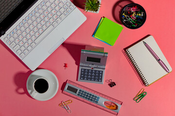 Items for business on bright colors in the office on the table 