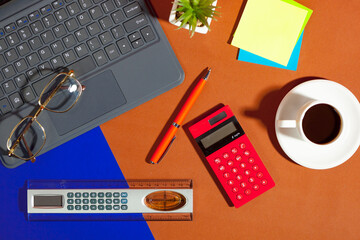 Items for business on bright colors in the office on the table 