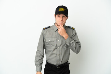 Young Russian security man isolated on white background having doubts and thinking