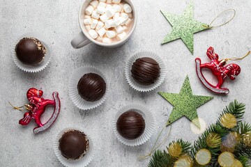 Hot cocoa chocolate ball bomb with marshmallow. Holiday winter drink. Handmade Christmas present. Top view.