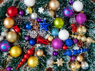 Christmas collection of New Year decorations. a big pile of christmas toys and tinsel while happy anticipation of new year holidays. Christmas background with balls.