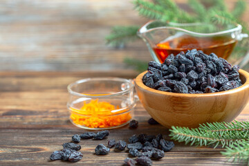 Raisins, orange peel and rum are the ingredients for a Christmas cake.