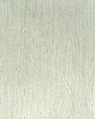 Light gray background in the form of wavy lines. The lines are arranged vertically. They have different depths relative to the surface.