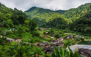 Village surrounded by Himalaya foothills, Arunachal Pradesh, India.