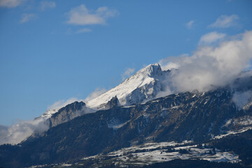 Snow-covered mountain, valley and blue sky in the European Alps, seen from Vaduz, Liechtenstein