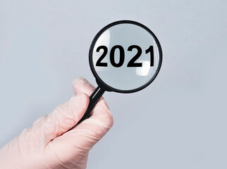 2021 recap, medical health review concept in hands.