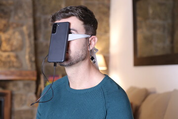 Concept representing man and smartphone overuse