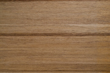 Light brown wood background.