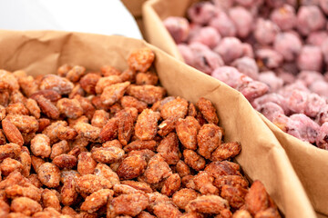 Roasted peanuts in icing sugar. Peanut  in powdered sugar  . groundnut, goober, monkeynut, earth-nut