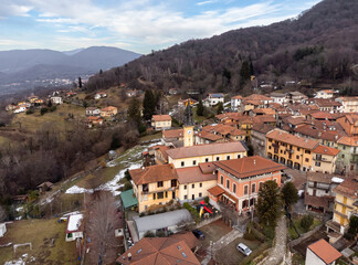 Fototapeta na wymiar Aerial view of small Italian village Bedero Valcuvia at winter season, situated in province of Varese, Lombardy, Italy