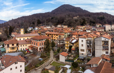 Fototapeta na wymiar Aerial view of small Italian village Bedero Valcuvia at winter season, situated in province of Varese, Lombardy, Italy