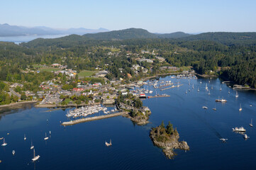 Aerial photograph of the town of Ganges with Grace Islet in the foreground, Saltspring Island,...