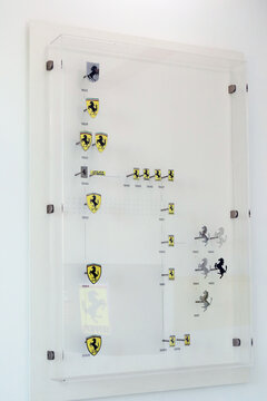 Modena, Italy, December 2021, MEF Ferrari Museum Casa Natale di Enzo Ferrari, Ferrari badges throughout the history of the team 
