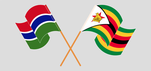 Crossed flags of the Gambia and Zimbabwe. Official colors. Correct proportion