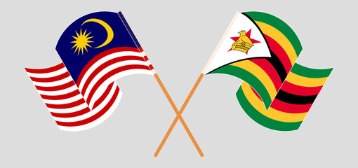 Crossed flags of Malaysia and Zimbabwe. Official colors. Correct proportion