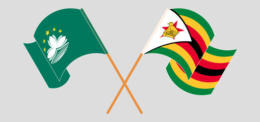 Crossed flags of Macau and Zimbabwe. Official colors. Correct proportion