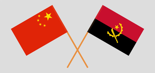 Crossed flags of China and Angola