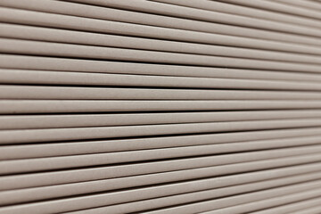 Obraz premium Stack of gypsum boards. Drywall packs. Close-up