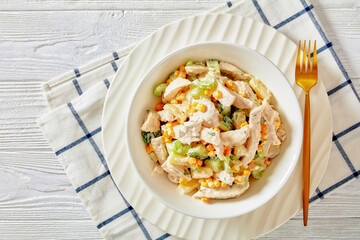 salad of chicken breast, corn, ananas, cucumber