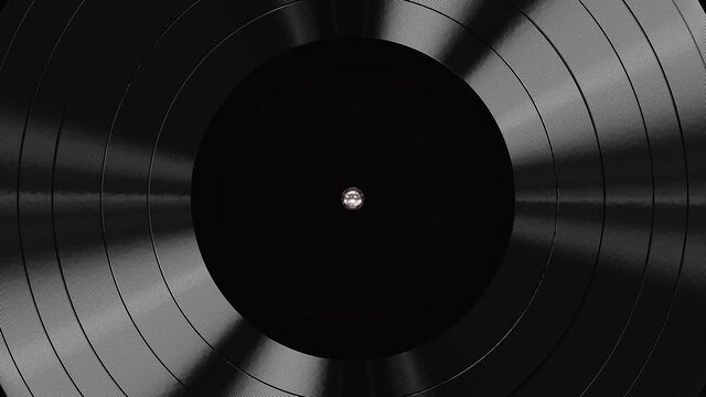 Realistic seamless looping 3D animation of the black label vinyl record rendered in UHD as motion background