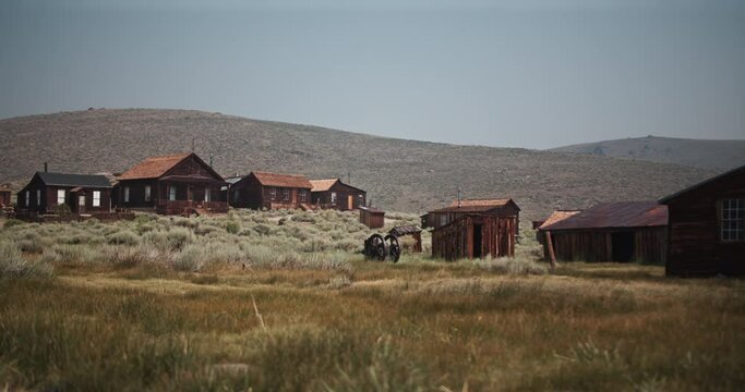 Old abandoned ghost town buildings in the hills of the gold rush area in California