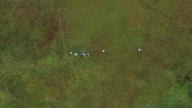 Science station research for studying wetlands meadows, drone aerial video shot ecosystem weather station swamp willows cycle carbon flux eddy covariance methane research physiological photosynthesis