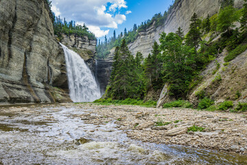 View on the Vaureal waterfall from the canyon, the most impressive waterfall of Anticosti Island, in Cote Nord region of Quebec, Canada