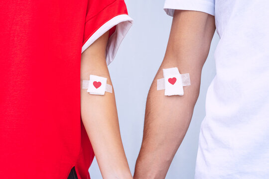 Man and woman blood donors. Blood donation. World blood donor day concept
