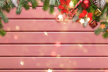 Decorative Christmas background with gold sparkling and baubles, holly and winter greenery.