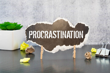 Procrastination word cloud concept. word Procrastination on black torn paper