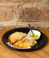 Traditional baked Argentine empanadas savory pastries filled with beef and chicken.