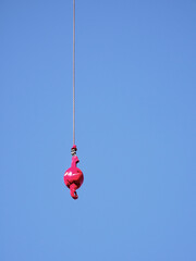 Obraz premium Tokyo,Japan - December 15, 2021: Crawler Crane or Luffing Jib Crawler Crane on blue sky background 