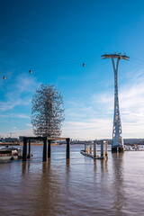 Thames cable car operated by Emirates Air Line in London. Crossing over river Thames.