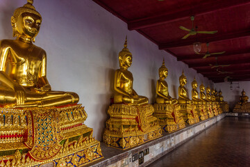 Golden buddha statues in Wat Mahathat Temple, Bangkok. Thailand