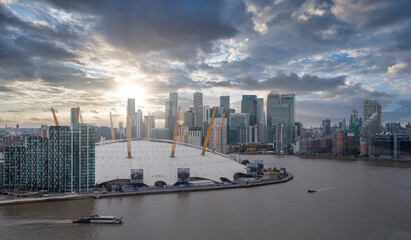 View from the river Thames over Millennium dome or O2 Arena in London, UK.  - obrazy, fototapety, plakaty