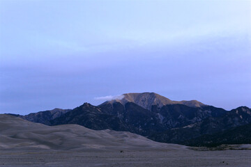 Obraz na płótnie Canvas Rocky mountains and sand dunes