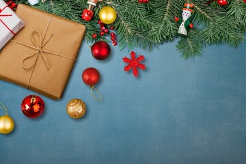 Fototapeta na wymiar Holiday background with Christmas gift box tree branch
