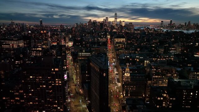 dusk flying south over Chelsea towards view of downtown NYC