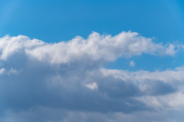 Naklejka na ściany i meble Blue sky and clouds in winter.