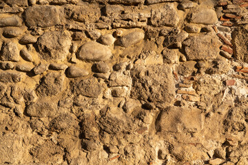 Unshaped stone wall pattern,wall made of rocks